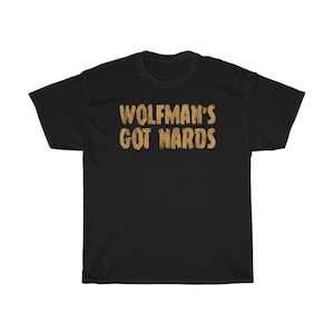 May include: Black t-shirt with the text "Wolfman's Got Nards" printed in gold.
