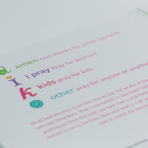 May include: A colourful printable poster with the words "amen", "i pray", "kids", and "other" in a playful font. The poster encourages prayer for different people and situations.