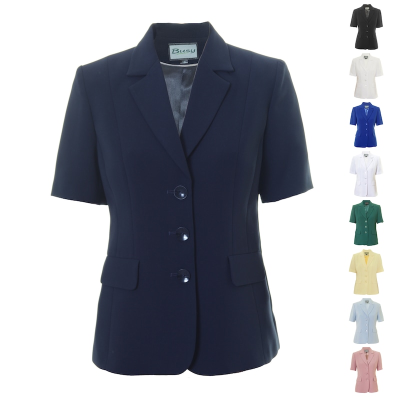 May include: A navy blue short-sleeved blazer with a three-button closure and two front pockets. The blazer has a classic collar and a 'Busy' label on the inside.