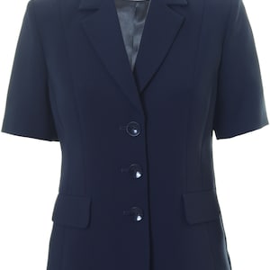 May include: A navy blue blazer with short sleeves and three buttons. The blazer has a single pocket on the left side and the label "Busy" on the collar.