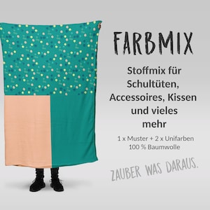 Könnte beinhalten: Ein Stoffmix mit einem Farbblock-Design in Türkis und Pfirsich. Der obere Teil zeigt einen türkisfarbenen Hintergrund mit einem Muster aus kleinen, bunten Kreisen. Der Text "FARBMIX" wird in Schwarz angezeigt, zusammen mit anderem deutschen Text.