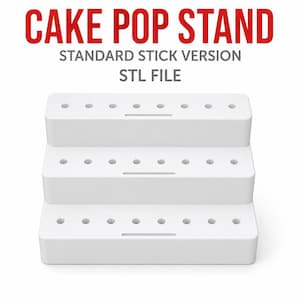 May include: A white, three-tiered cake pop stand with multiple circular holes on each level for holding sticks. The text CAKE POP STAND, STANDARD STICK VERSION, and STL FILE is displayed in red and gray above the object.