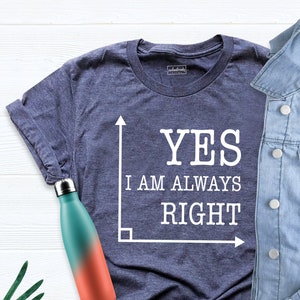 May include: A navy blue t-shirt with a white graphic of a right angle and the text "YES I AM ALWAYS RIGHT".