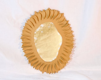 Petal mirror with gold tan