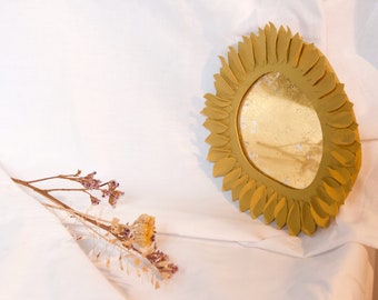 Petal mirror with gold tan