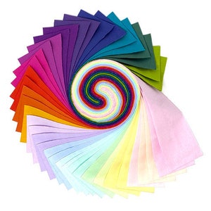 May include: A rainbow fabric roll with 20 different colors of fabric, including purple, pink, orange, yellow, green, and blue. The fabric is arranged in a spiral pattern.