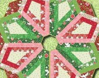 May include: A Christmas tree skirt pattern with a 2-1/2 inch strip-friendly design. The pattern features a red, green, and white color scheme with a repeating pattern of doves and snowflakes. The pattern is titled "Christmas Magic Tree Skirt" and is from Amanda Murphy Design.