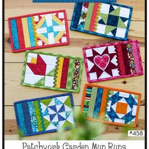 May include: Patchwork Garden Mug Rugs pattern with instructions for 6 mug rugs and 6 applique quilt blocks. The finished size is 10" x 6". The pattern is by Leanne Anderson and is #458. The image shows six different mug rug designs with a variety of colors and patterns.