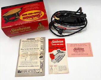 Plancha de vapor o seca Sunbeam vintage de 1950, con caja e instrucciones originales, estilo retro.