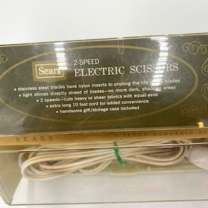 Vintage Sears 2 Speed Electric Scissors Light Fabric Cutter Shears Works. The case lid is broke.