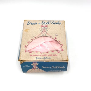 Vintage Dress-a-Doll Disks Craft Doll Johnson & Johnson 1958 Scatola aperta rosa.