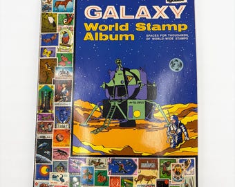 Álbum de sellos Galaxy World Hygrade 1983 Grossman Stamp Co. Algunos sellos