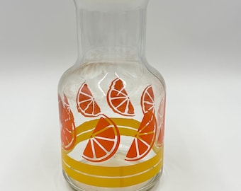 Jarra de jugo de naranja Libbey of Glass vintage de los años 70 con tapa rasgada / Jarra de jugo de 23 cm con tapa / Cristalería de cocina retro / Artículos de bar de mediados de siglo
