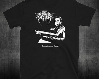 May include: Black t-shirt featuring a white graphic of a man holding a gun. The graphic includes the text "Interplanetary Hunger" and the band name "BURzum" in black metal font.