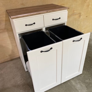 Double trash can cabinet, pull out