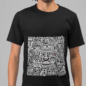 May include: Black t-shirt featuring a white graphic print of a complex design with abstract faces and patterns.