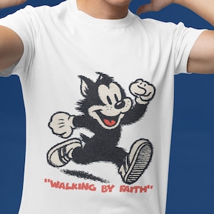 Faith-Based Cartoon Cat Tee, Walking by Faith, Motivational Shirt, Cute Graphic T-Shirt, Gift for Him/Her, Unisex Heavy Cotton Top