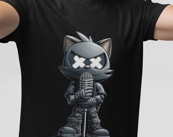 May include: Black t-shirt featuring a cartoon cat character with glowing white 'XX' eyes, holding a microphone. The cat is dressed in a gray outfit with boots. The design is a graphic illustration.