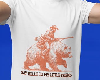 Cowboy Riding Grizzly Bear T-Shirt: Wild West Graphic Tee