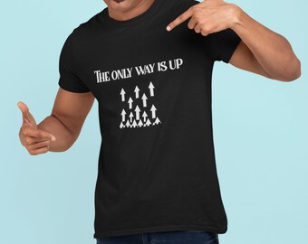 May include: A black t-shirt with the text "The Only Way Is Up" in white lettering. The text is accompanied by a graphic of white arrows pointing upwards.
