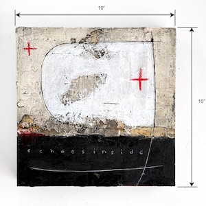 May include: Abstract mixed media artwork, 10 inches square. The piece features a white, rounded shape over a black base, with red cross symbols and the text "echoes inside". The artwork has a textured, aged appearance.