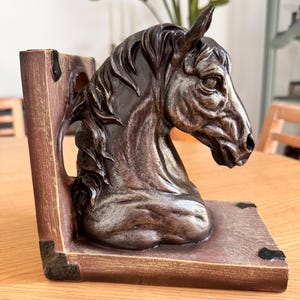 Bookend in the shape of a black horse