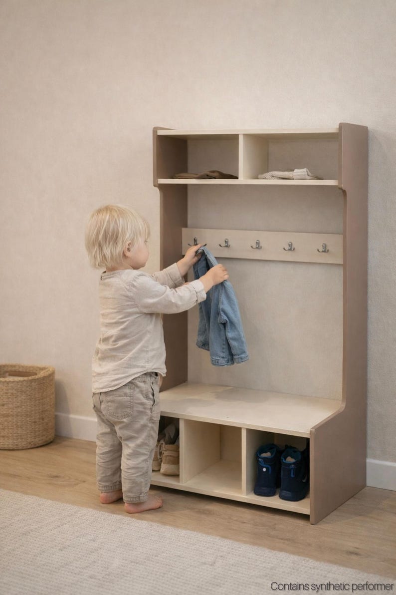 May include: A light-colored wooden storage unit featuring an upper shelf with two compartments, a middle section with five silver metal hooks, and a lower bench area with three open cubbies for shoe storage. The unit has a smooth, light wood finish.