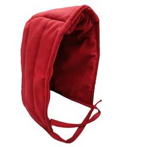 May include: A red quilted fabric hood with a long tie. The hood is made of a soft, comfortable material and is perfect for keeping your head warm.