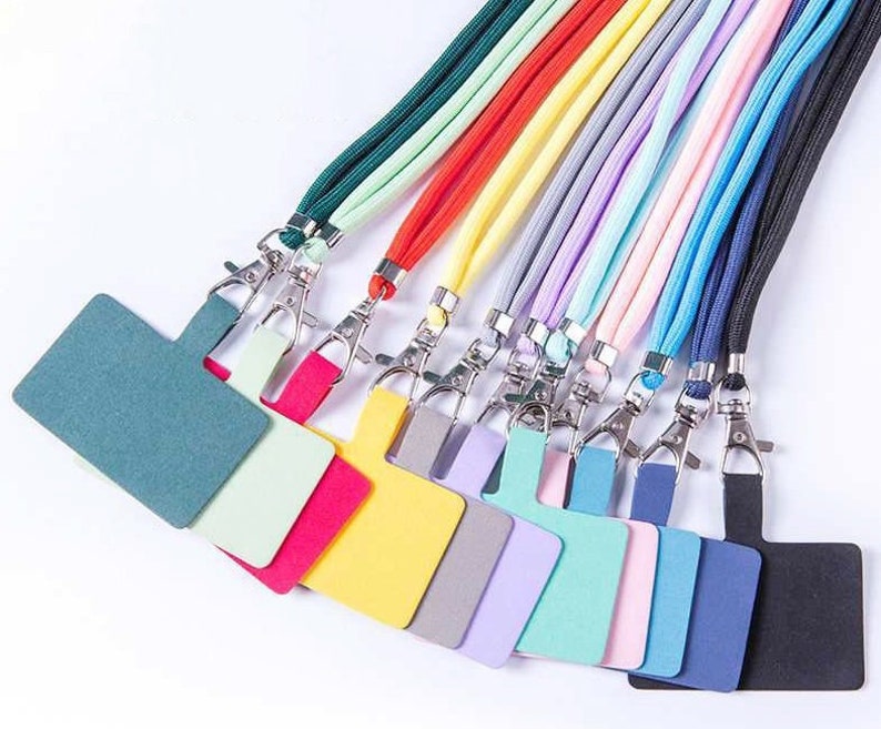 11 different colored phone holding lanyards