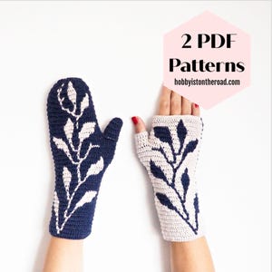 May include: Two crochet fingerless gloves with a white leaf pattern on a navy blue background. The gloves are shown on a white background with the text "2 PDF Patterns hobbyistontheroad.com" in a pink hexagon.