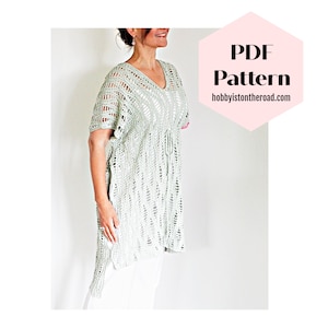 May include: A crochet top with a loose, flowing fit and a V-neckline. The top is made in a light green colour and has a delicate, openwork pattern. The top is shown being worn by a person against a white background.