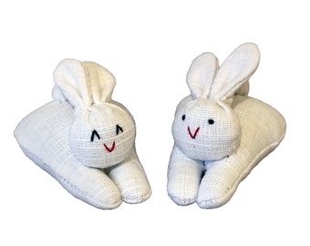 a pair of cute handmade small bunnies Easter bunny white