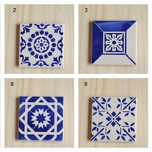 May include: Eleven different blue and white ceramic tile designs with intricate patterns. Tiles All Models.
