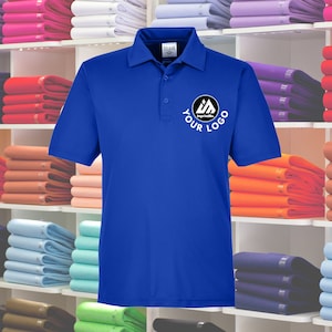 May include: A royal blue polo shirt with a white collar and short sleeves. The shirt has a black circle with a white logo and the text "YOUR LOGO" in white.