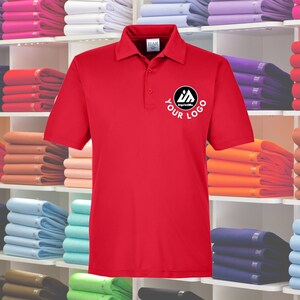 May include: Red polo shirt with a white logo that says "Your Logo" and "ImprintMe" in a circle on the left chest.
