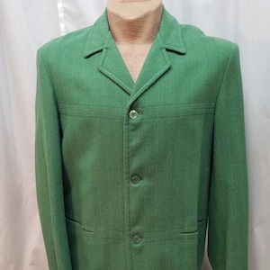 May include: A set of three ceramic mugs with a speckled, matte finish in cream, light grey, and dark grey. Each mug has a simple, minimalist design, suitable for coffee or tea.