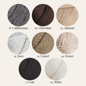 May include: Yarn color chart with 10 different yarn colors, including Cobblestone, Chocolate, Almond, Dove, Camel, Oyster, Coal, White, and more.