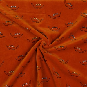 Nicki small dinosaurs, dinosaur fabric, brick red, teracotta orange