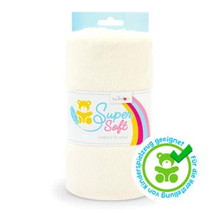 May include: A rolled-up, off-white plush fabric with a label that reads "Super Soft" and "Snugly (5 mm)". The label features a yellow teddy bear and a rainbow design. A green seal with a teddy bear and checkmark is also visible.