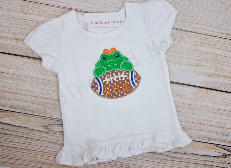 Gator with bow girl shirt Children LSU fan Florida Gator Football applique shirt Game Day BabyToddler Applique shirt