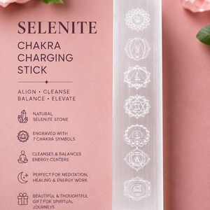 May include: A rectangular selenite charging stick featuring seven engraved chakra symbols arranged vertically. The text on the left reads: SELENITE CHAKRA CHARGING STICK, ALIGN CLEANSE BALANCE ELEVATE, NATURAL SELENITE STONE, ENGRAVED WITH 7 CHAKRA SYMBOLS.