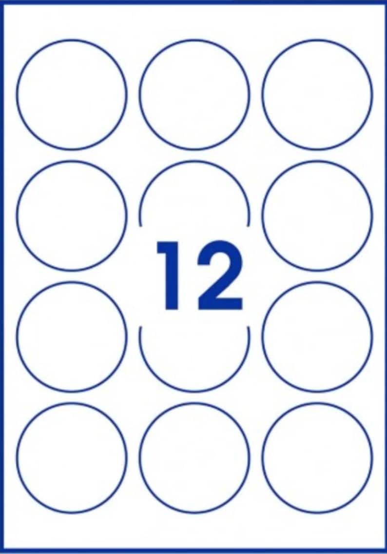 May include: A white rectangular sheet featuring twelve blue circular outlines arranged in a grid of four rows and three columns. The center position is occupied by the bold blue number 12, replacing the circular outline in that specific spot.