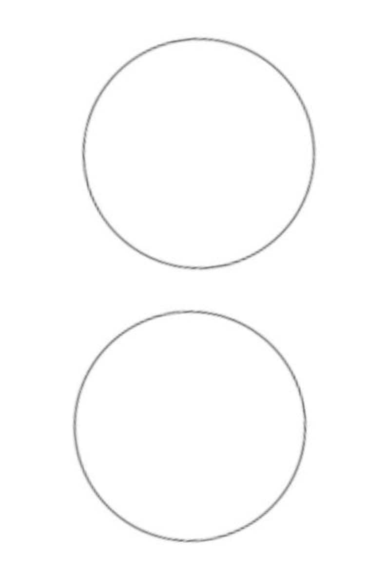 May include: Two identical, thin, black circular outlines are positioned vertically against a plain white background. Each circle is perfectly round, featuring a clean, continuous line that defines the shape without any fill or interior detail.