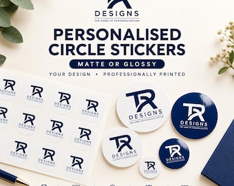Könnte beinhalten: Ein Bogen mit runden Aufklebern und mehrere lose Aufkleber in verschiedenen Größen, alle mit dem dunkelblauen TR Designs Logo. Der Text lautet Personalized Circle Stickers, Matte or Glossy, Your Design, Professionally Printed.