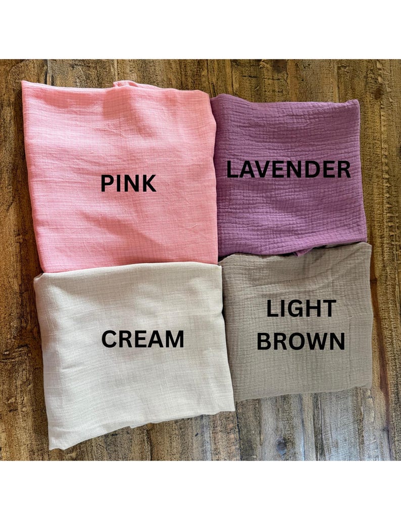 May include: Four folded pieces of textured fabric in pink, lavender, cream, and light brown. Each piece is labeled with black text: PINK, LAVENDER, CREAM, and LIGHT BROWN, indicating the specific color of each individual fabric square.