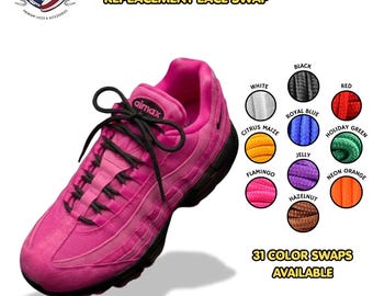 May include: A bright pink athletic sneaker with black laces and a black sole. The image displays text reading THICK ROUND REPLACEMENT LACE SWAP and 31 COLOR SWAPS AVAILABLE, alongside circular swatches of laces in white, black, red, citrus maize, royal blue, holiday green, flamingo, jelly, neon orange, and hazelnut colors.