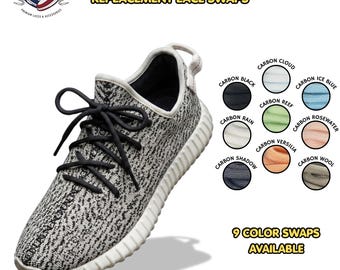 May include: A low-top sneaker with a black and white patterned knit upper and a white ribbed sole. The shoe features black rope laces. Text includes Carbon Series Rope Replacement Lace Swaps and 9 Color Swaps Available with labels for Carbon Cloud, Black, Ice Blue, Reef, Rosewater, Rain, Versilia, Shadow, and Wool.