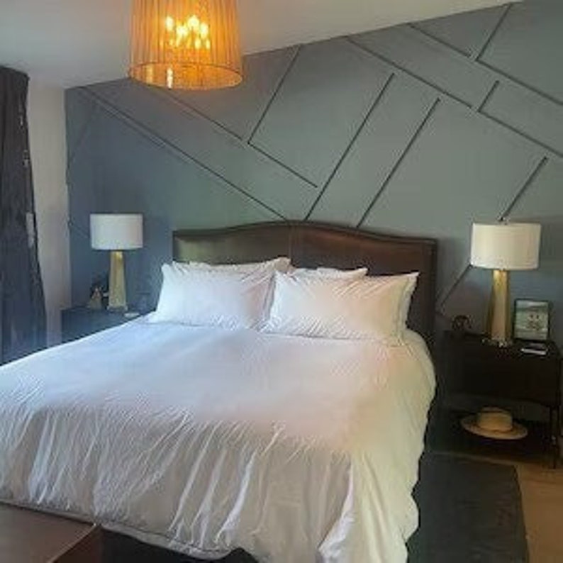 Bed in front of Dimensional Accent Wall