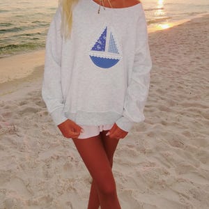 Beachy sailboat patchwork crewneck blue