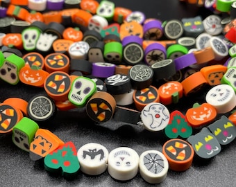 May include: A collection of colourful Halloween-themed polymer clay beads. The beads feature various designs, including skulls, pumpkins, ghosts, candy corn, bats, spiders, and more.